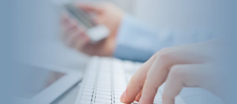 Man with laptop and mobile